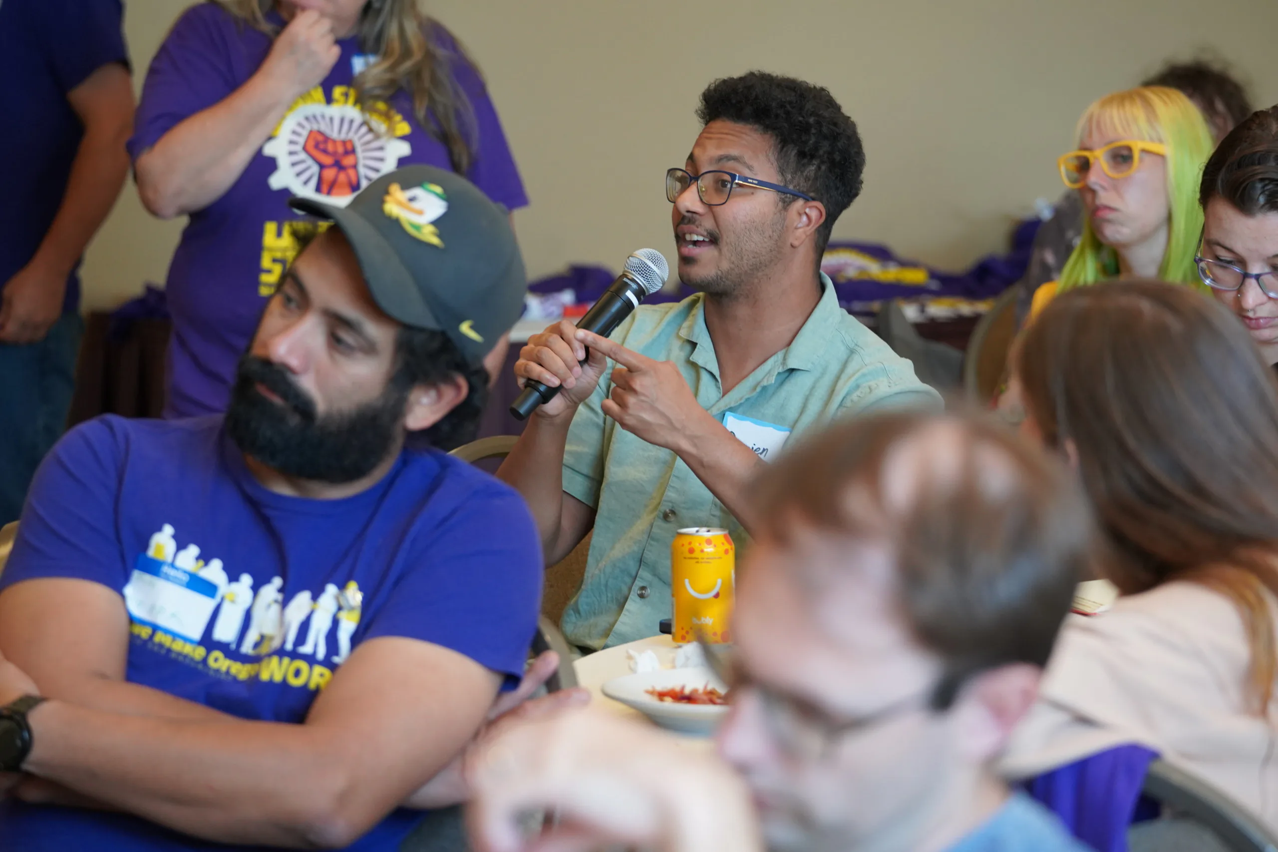 OSU member leader Damien Manassa speaks during the Higher Education Bargaining Conference.