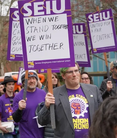 Oregon State University workers rally in support of the higher education bargaining team.