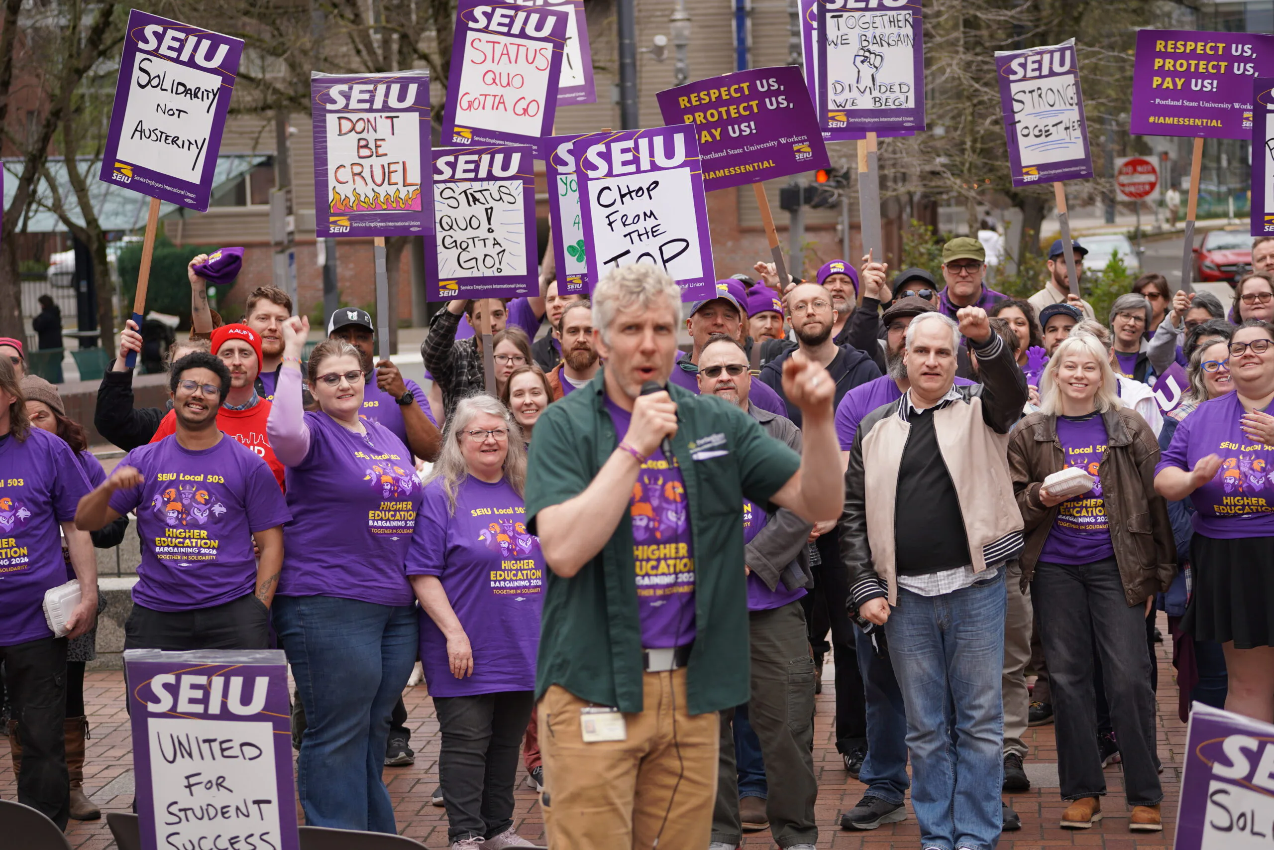 A speaker addresses higher education workers at a Portland State University bargaining rally.