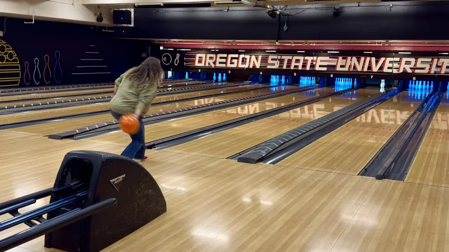 A Local 083 member bowling at an OSU community gathering